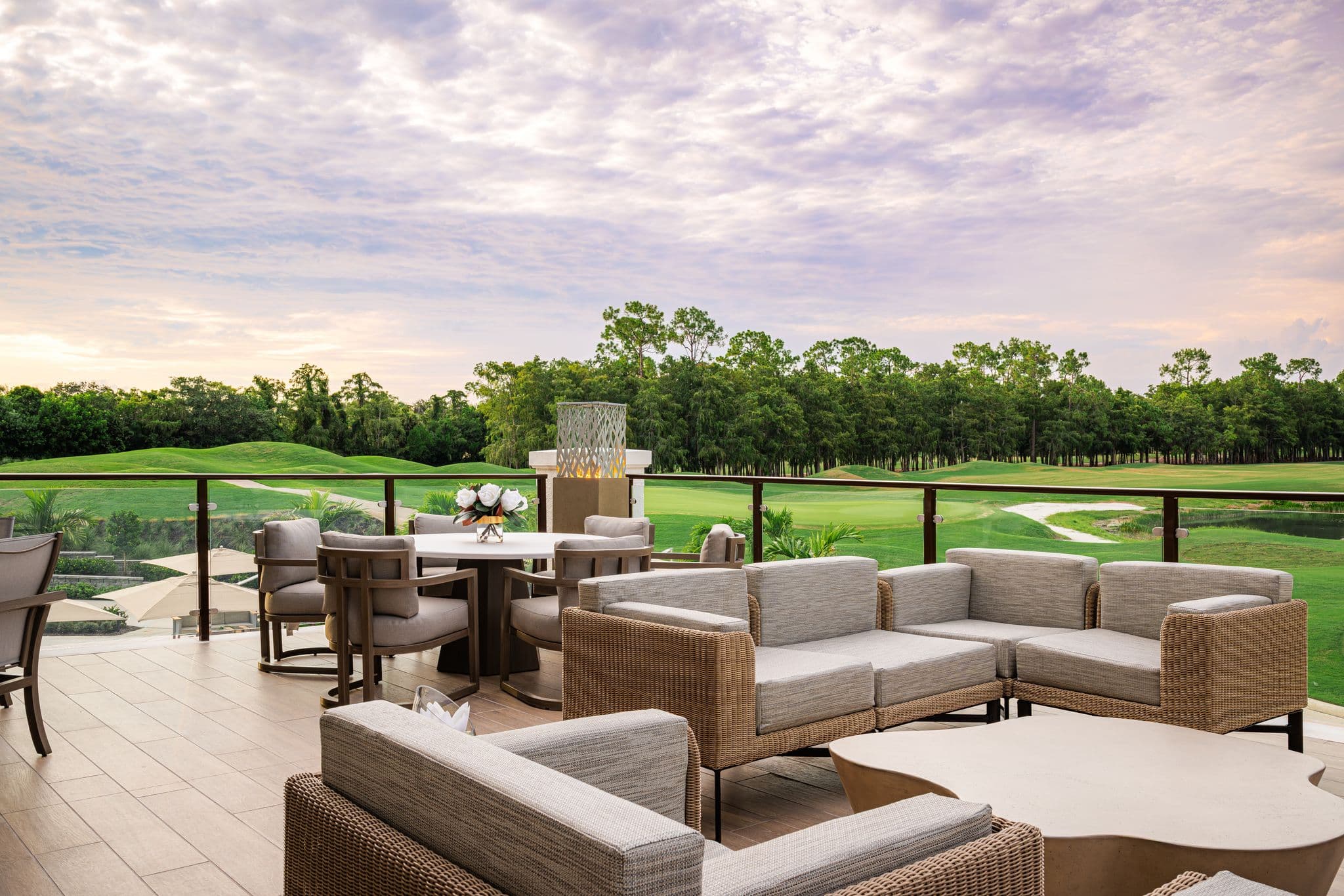 Lounge seating on the upper terrace, looking out over the course